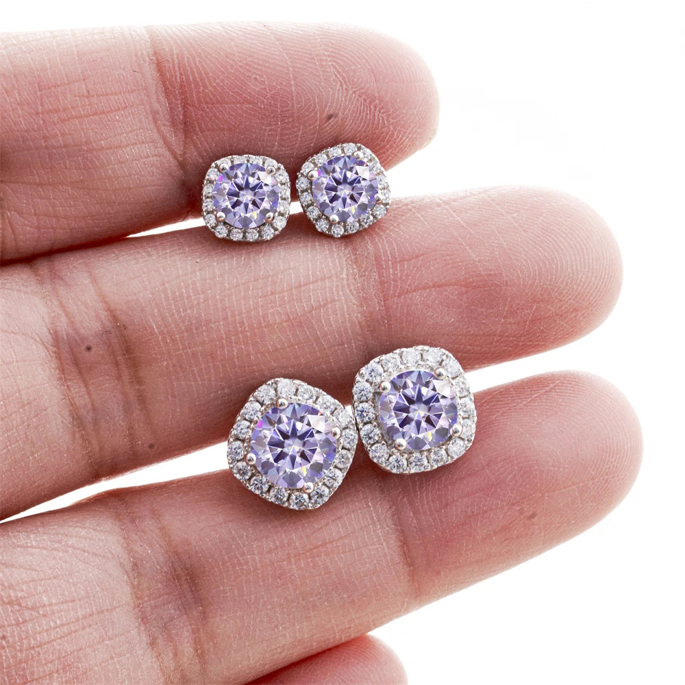 Colored Moissanite Cushion Halo Stud Earrings in Silver - Light purple size comparison on hand