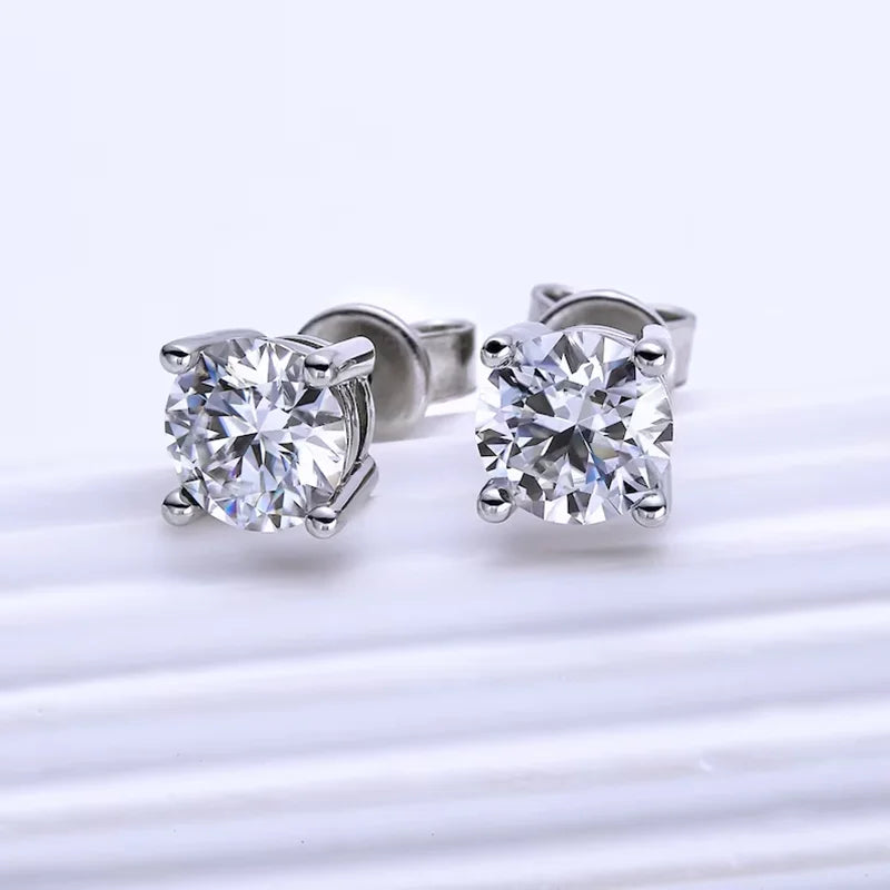 Four-Prong Round Moissanite Stud Earrings in Silver — Silver studs from front