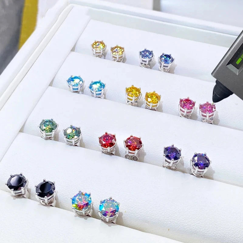 Colored Six-Prong Moissanite Stud Earrings in Sterling Silver — Colored studs on display