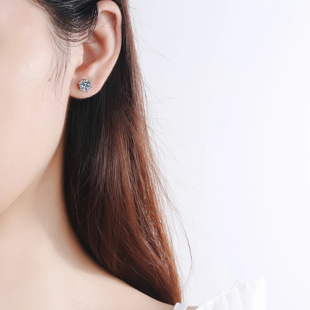Colored Six-Prong Moissanite Stud Earrings in Sterling Silver — Shown on ear