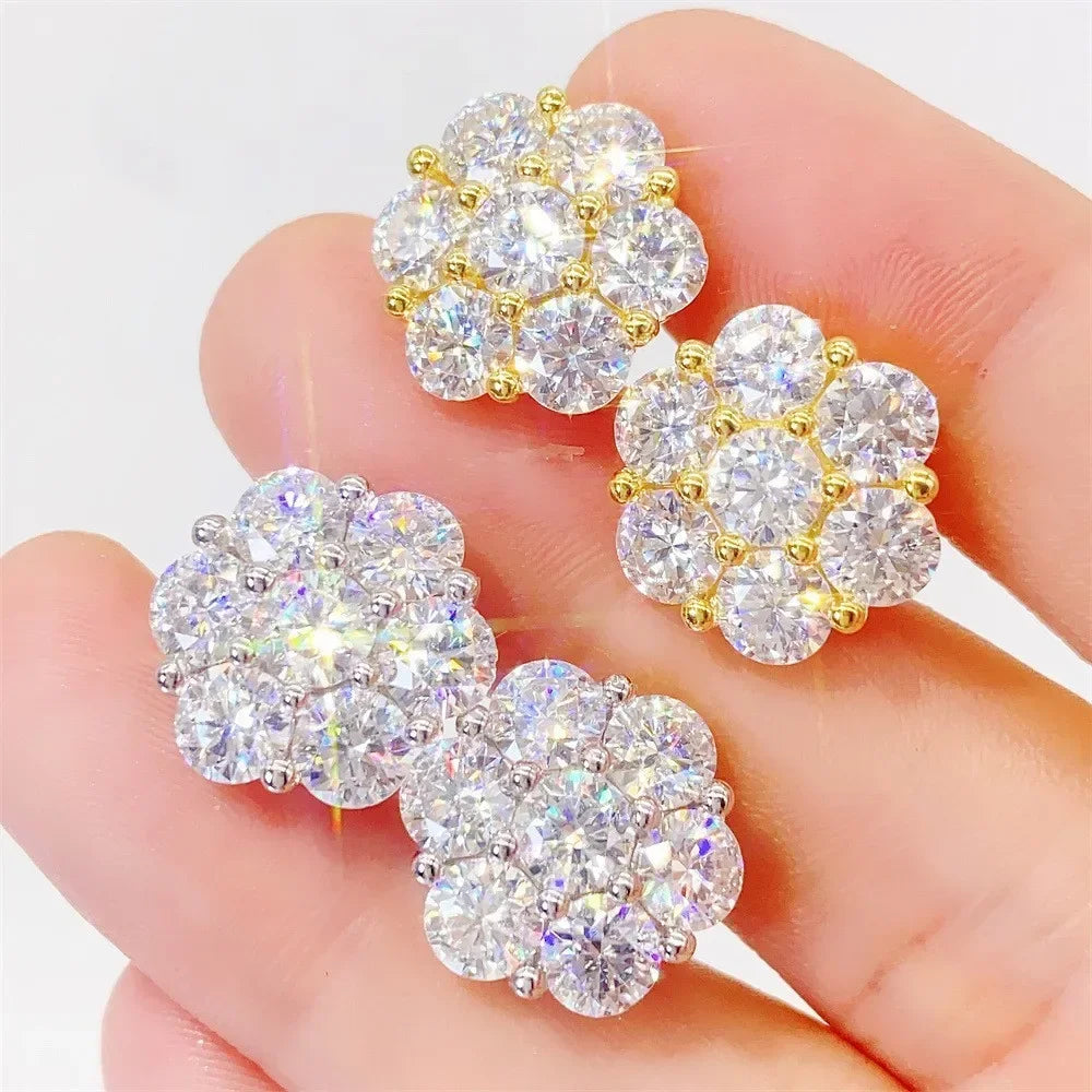 Seven-Stone Flower Moissanite Cluster Stud Earrings — Gold-tone and silver clusters on hand