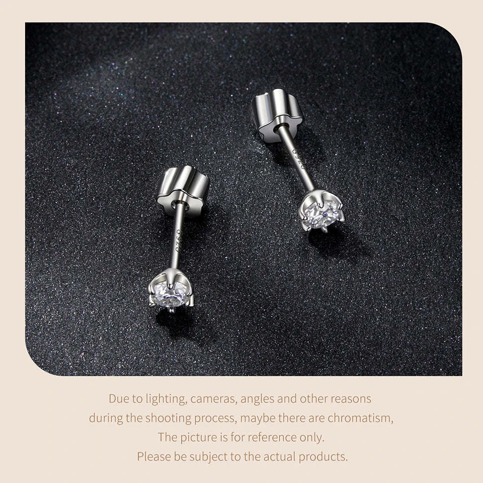 Round Moissanite Crown-Setting Stud Earrings in Sterling Silver — Posts on dark surface