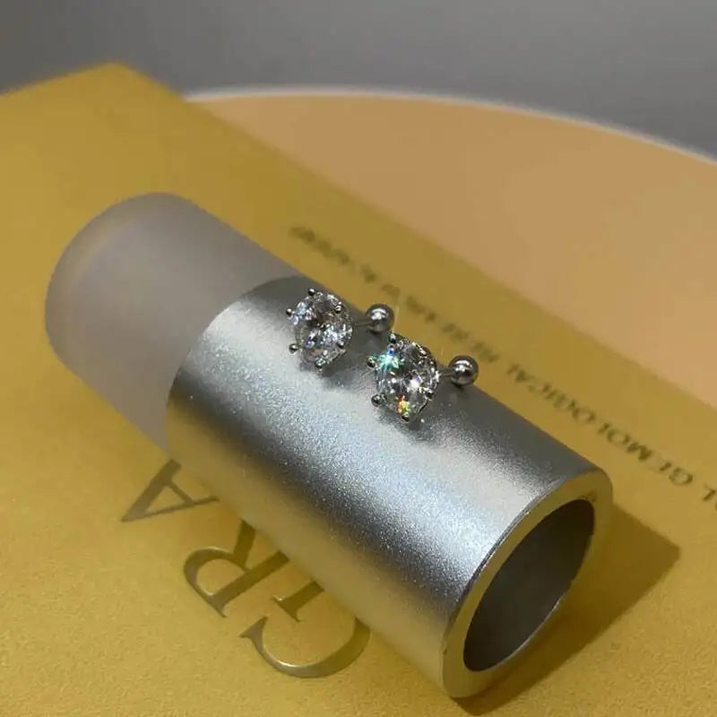 Round Moissanite Ball-Back Stud Earrings in Sterling Silver — Stud pair on display