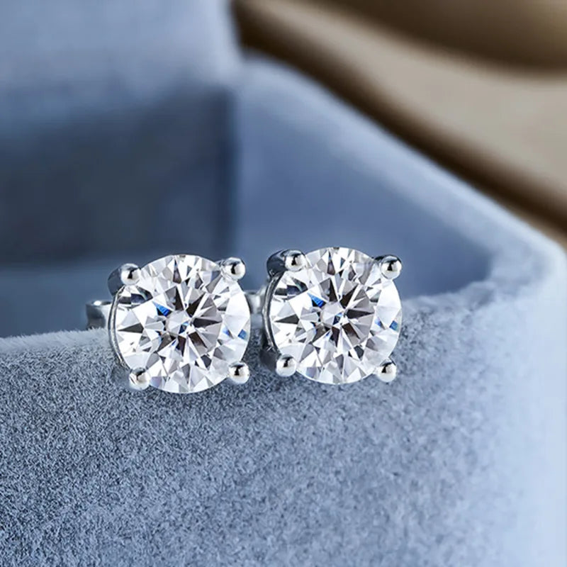 Black & White Moissanite Four-Prong Stud Earrings - white pair close-up