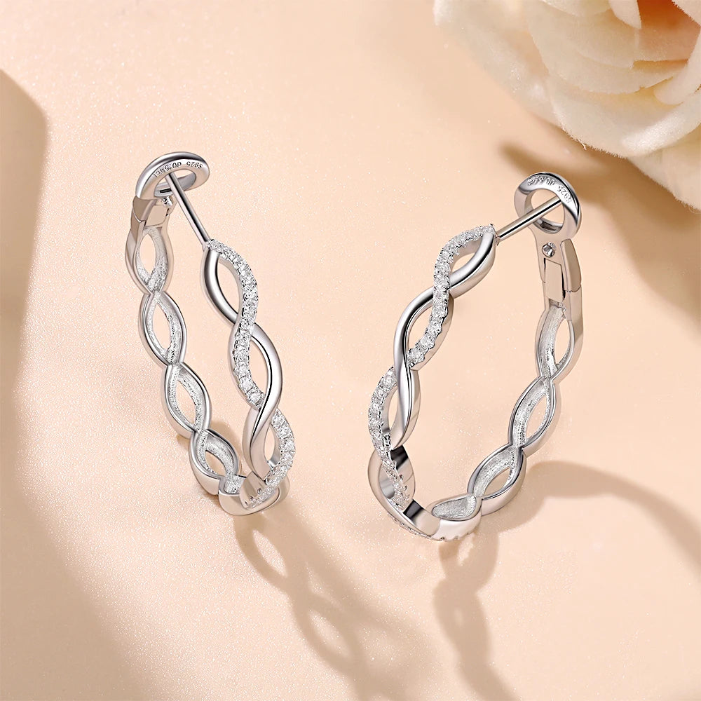 Twisted Infinity Moissanite Hoop Earrings in Sterling Silver — Silver twisted hoops