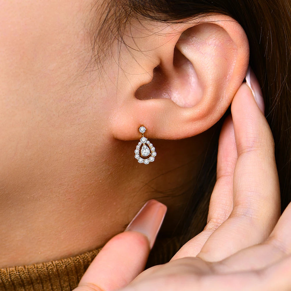 Pear Moissanite Halo Drop Earrings in Sterling Silver — Pear halo drop worn on ear — BandsCo Straps