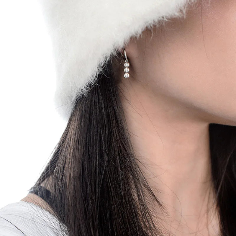 Moissanite Leaf, Star & Bezel Drop Earrings in Sterling Silver — Round bezel drops worn on the ear