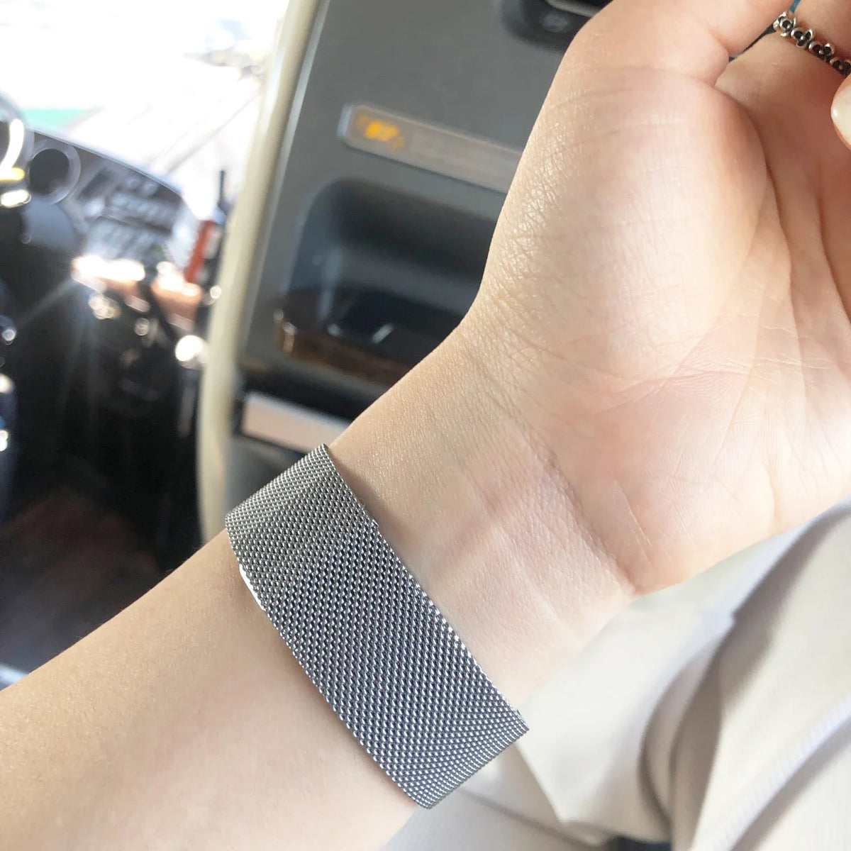 Gray Milanese mesh watch band worn on wrist for Samsung Galaxy Watch8, Watch8 Classic and Watch9