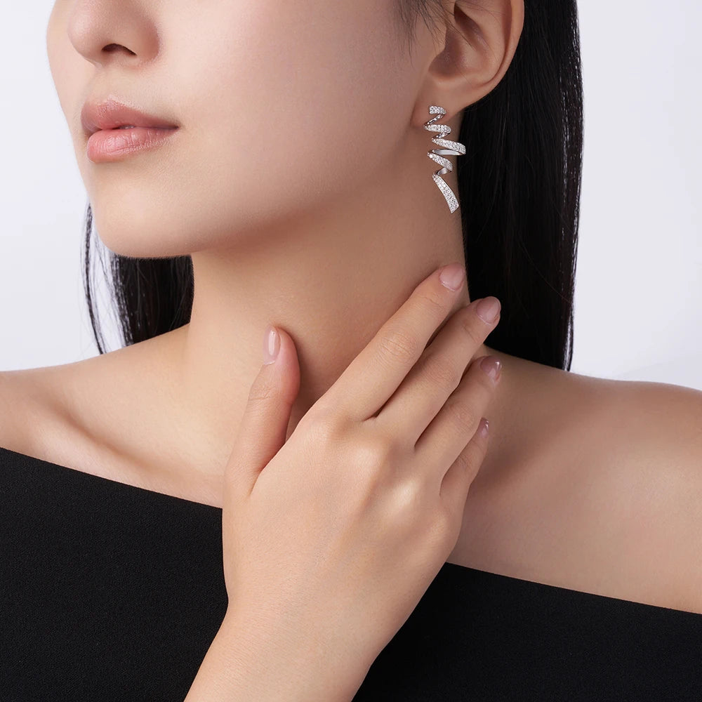 Twisted Spiral Moissanite Drop Earrings in Sterling Silver — Twisted earrings worn