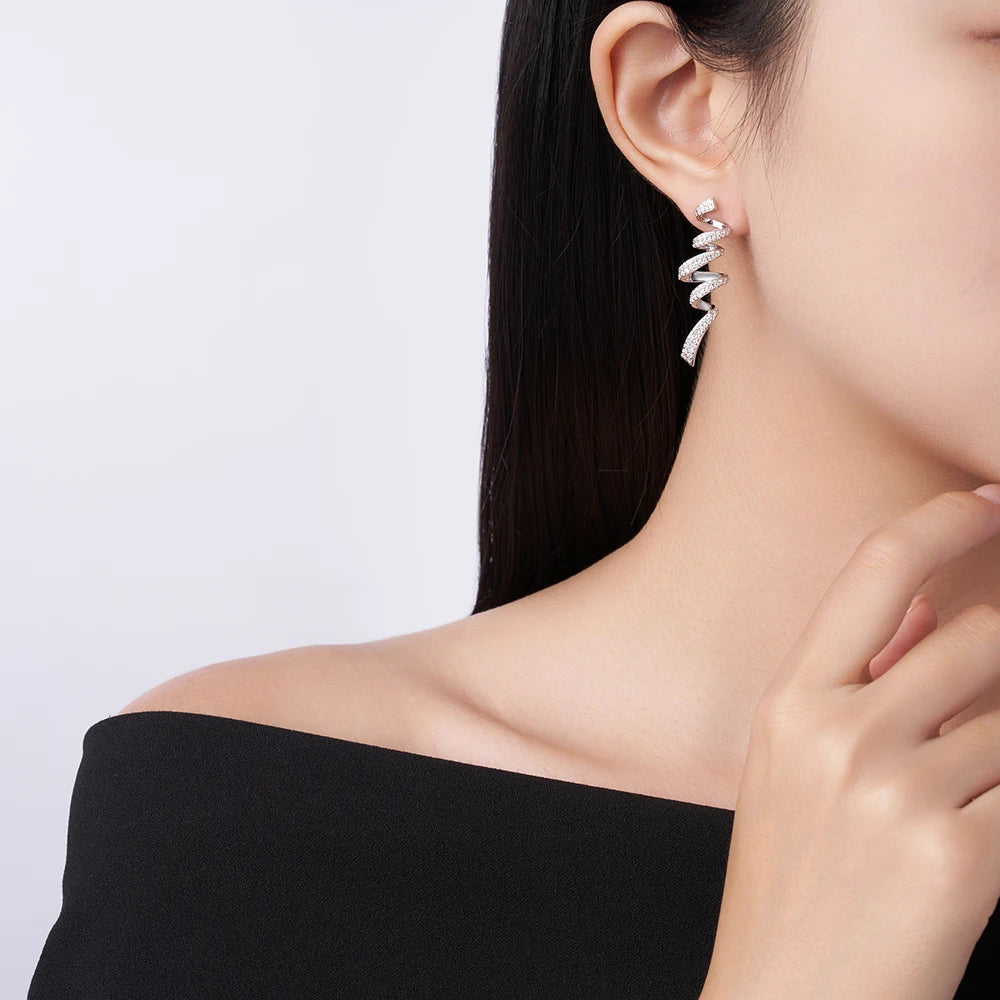 Twisted Spiral Moissanite Drop Earrings in Sterling Silver — Spiral drops worn