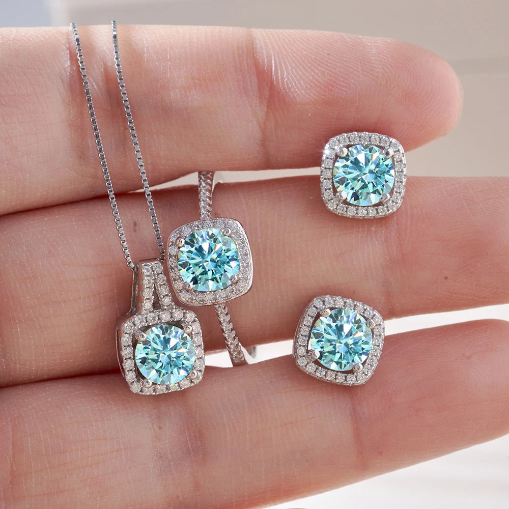 Colored Cushion Halo Moissanite Necklace, Earrings & Ring Set — Blue set on hand