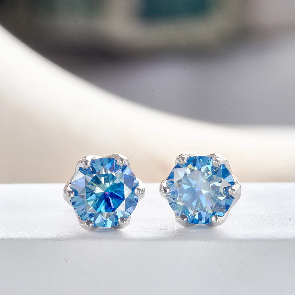 Colored Round Moissanite Stud Earrings in Sterling Silver - blue stones front view