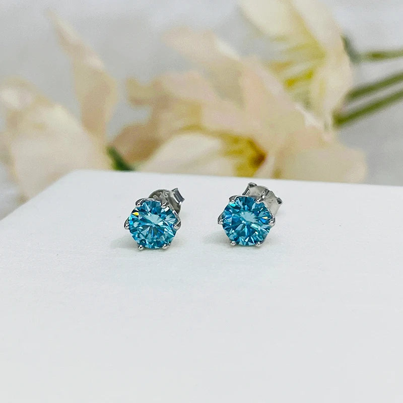 Colored Round Moissanite Stud Earrings in Sterling Silver - blue studs close-up